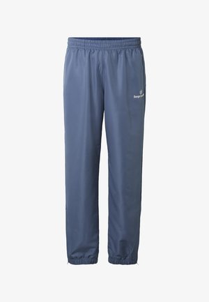 Blaue Jogginghose mit elastischem Bund und Bündchen, leichtem Stoff und einem kleinen weißen "Sergio Tacchini"-Logo am rechten Oberschenkel.