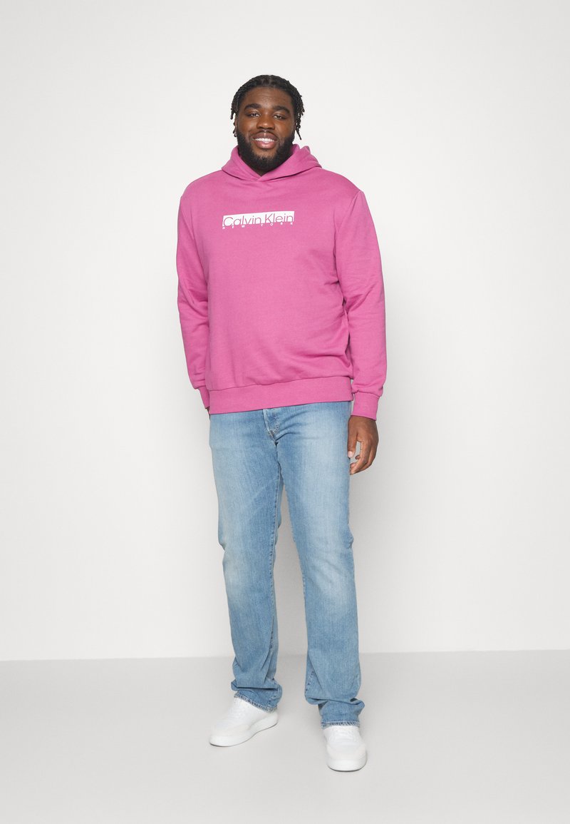 pink calvin klein sweatshirt
