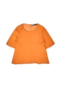 Krótki rękaw pomarańczowej bluzki z zaokrąglonym dekoltem, miękka w dotyku, z zapięciem na plecach na kluczyk. Gładka tkanina, luźny krój.