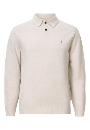 Beiger Strickpullover mit Polokragen, drei schwarzen Knöpfen, gerippten Bündchen und Saum. Mit einem dezenten Logo-Detail auf der Brust.
