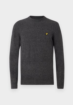 Grå genser laget av mykt stoff, med rund hals og lange ermer. Inkluderer en liten gul logo på brystet.