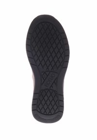 Black rubber shoe sole with a textured, patterned surface. Features a diamond tread for grip and embossed logo. Rounded toe design.