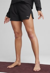 Puma PREMIUM STUDIO - Pantalón corto de deporte - black