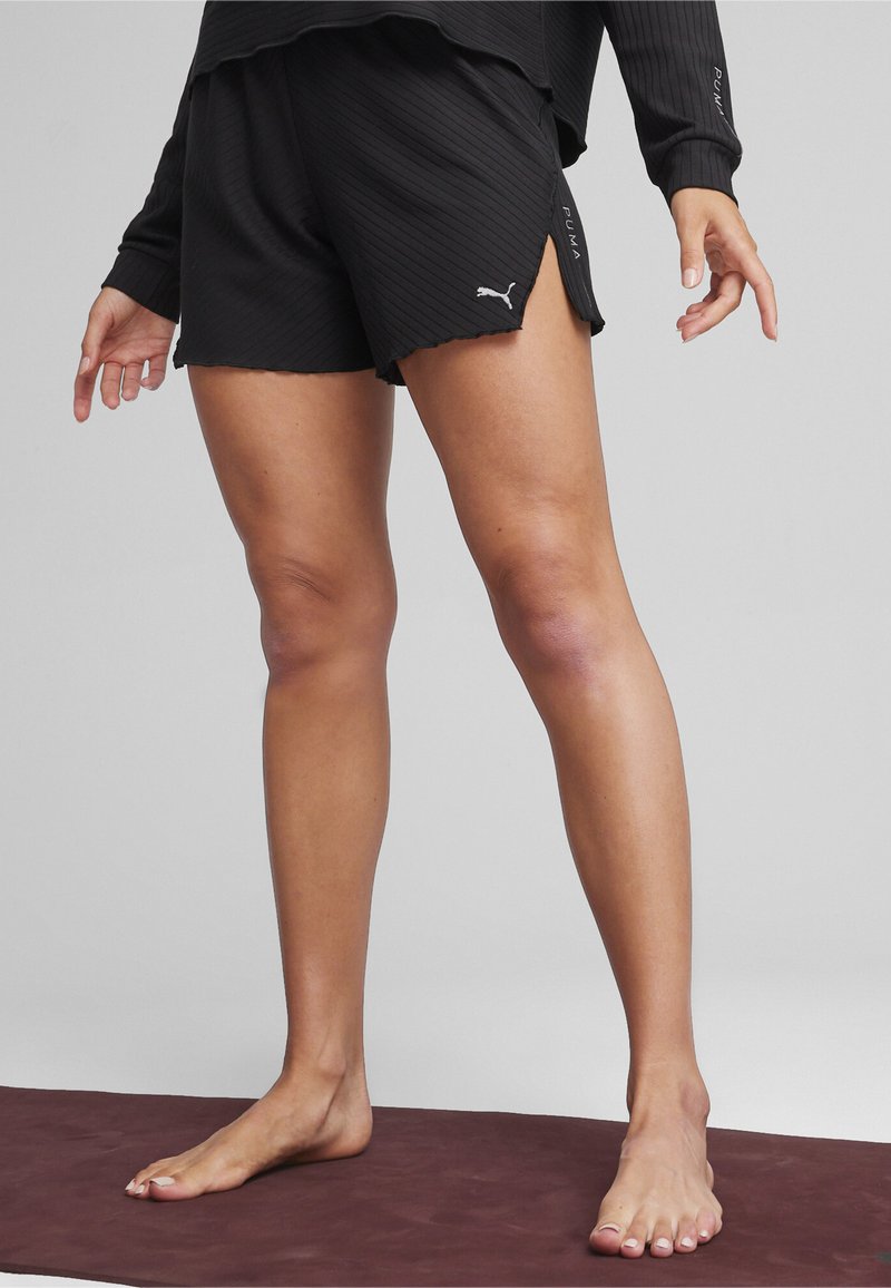 Puma PREMIUM STUDIO - Kurze Sporthose - black