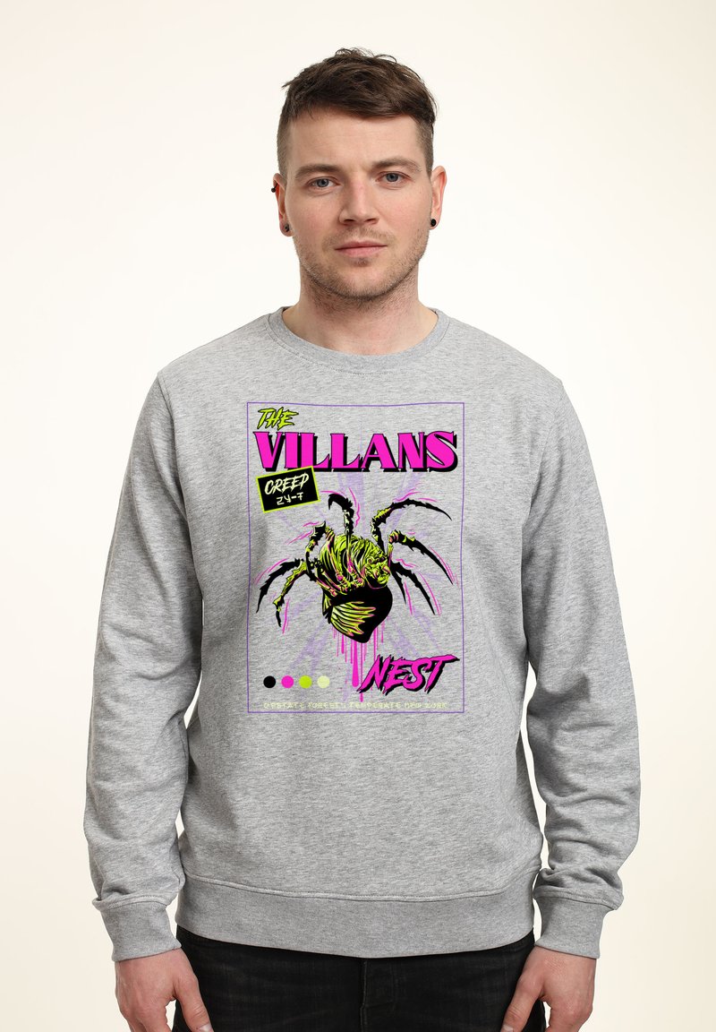 Grå sweatshirt med en färgglad grafisk design. Trycket visar en stiliserad spindel med texten "THE VILLAINS NEST" i fet, livfulla färger.