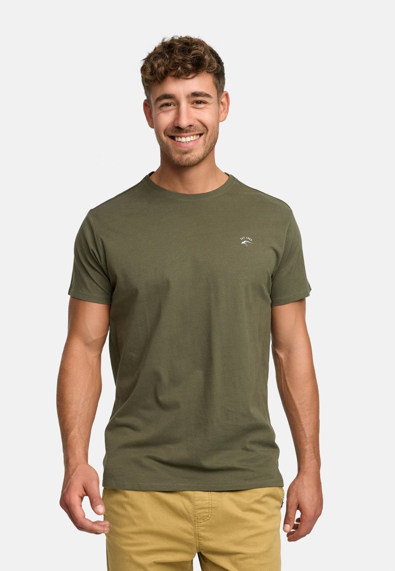 Olive green cotton T-shirt with a round neck, short sleeves, and a small white logo on the chest. Smooth texture and relaxed fit.