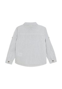 Camicia a maniche lunghe a righe con colletto, caratterizzata da strisce verticali blu e bianche, polsini con bottoni e orlo curvo. Tessuto di cotone testurizzato.