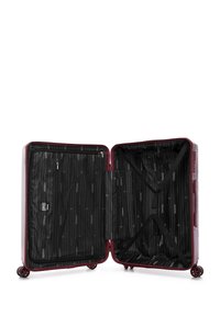 Open maroon hard-shell suitcase with black interior lining, mesh zippered compartment on one side, and crisscross straps on the other side.