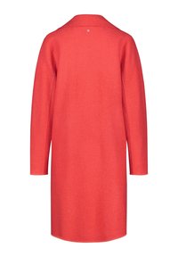 Red wool blend coat with a collar, long sleeves, and a straight cut. Features a single button at the back neckline. Smooth texture.