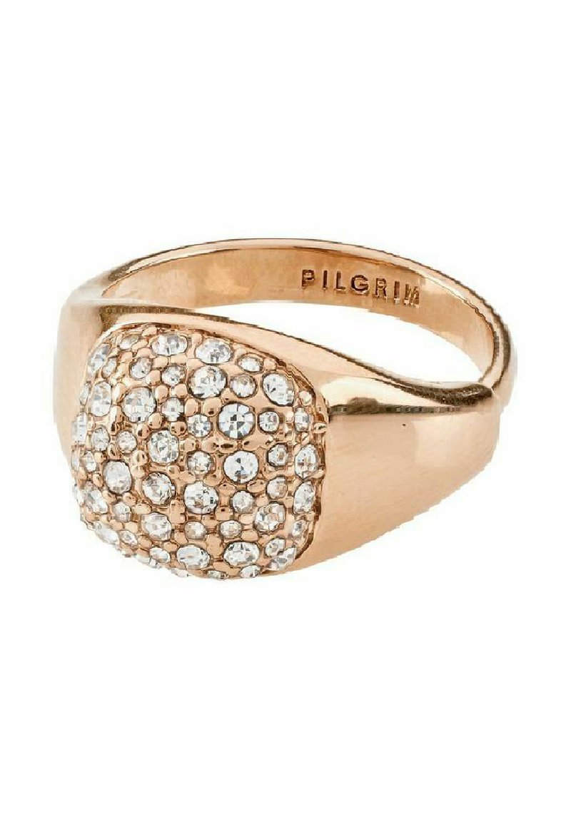 Bague en or rose au design épais avec un fini poli brillant et une surface supérieure ornée de multiples cristaux transparents.
