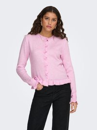 Pink knitted cardigan with a ruffled hem and cuffs, featuring a button-down front. The fabric appears soft with a smooth texture.