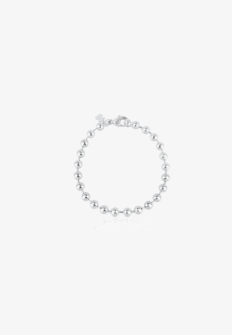 Bracciale in argento con una serie di perle tonde lucidate e chiusura a moschettone. Texture liscia, dimensione uniforme delle perle e lucentezza.