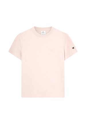 Helles rosa Champion T-Shirt mit kurzen Ärmeln und Rundhalsausschnitt, kleinem gesticktem Logo auf der Brust und Logo-Patch am linken Ärmel.