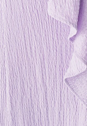 Lavender textured fabric with a crinkled surface, showing varying patterns and folds. Soft, lightweight, with a slightly wrinkled edge.