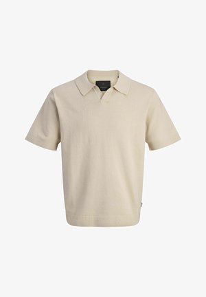 Lys beige kortermet polo skjorte laget av teksturert stoff med klassisk krage og v-halsåpning, med en rett linning.