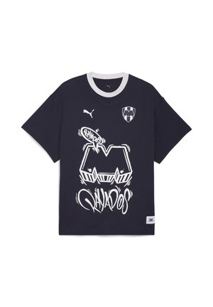 Sort bomulds T-shirt med en hvid rund halsudskæring. Grafisk print med "Rayados" i stiliseret tekst og en klublogo på brystet.