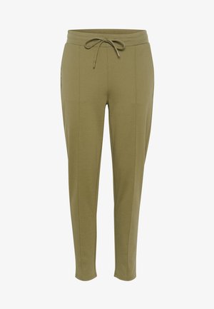 Maslinasto zelene trenirke izrađene od mekanog materijala, s pojasom na izvlačenje, suženim nogavicama i bočnim džepovima s glatkom teksturom.