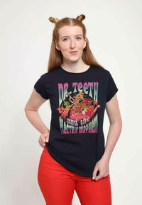 Svart bomull t-shirt med en färgglad grafisk tryck av karaktärerna "Dr. Teeth and the Electric Mayhem." Kort ärm, avslappnad passform.