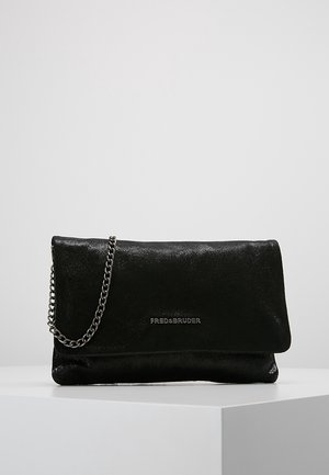 Black clutch bag with fold-over flap, silver chain strap, and "FREDsBRUDER" logo on front, displayed on a white pedestal.