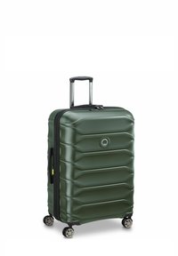 Valigia rigida verde con texture a righe, cerniera nera, manico estensibile e quattro ruote girevoli per una facile mobilità.