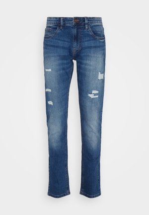 Blue denim jeans featuring a straight cut, distressed details with multiple rips, sturdy stitching, and a classic five-pocket design.