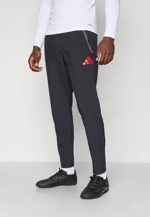 LIVERPOOL FC TIRO 25 COMPETITION VIS TECH TRAVEL PANTS - Klub merchandise - black/strawberry red