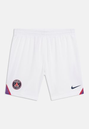 Άσπρα ποδοσφαιρικά σορτς Paris Saint-Germain με κόκκινες και μπλε πλευρικές λεπτομέρειες και μαύρο λογότυπο Nike μπροστά.
