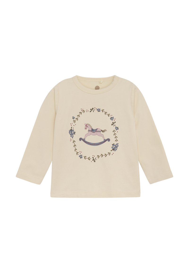 Crème-kleurig shirt met lange mouwen, voorzien van een schommelpaard grafiek omringd door bloemenpatronen in verschillende kleuren, gemaakt van zachte stof.