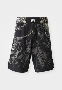 Shorts noirs avec un imprimé graphique multicolore présentant des motifs mécaniques. Taille élastique avec un logo à l'arrière. Tissu léger.