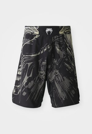 Svarte shorts med en multitonet grafisk utskrift som har mekaniske design. Elastisk liv, med logo på baksiden. Lett stoff.