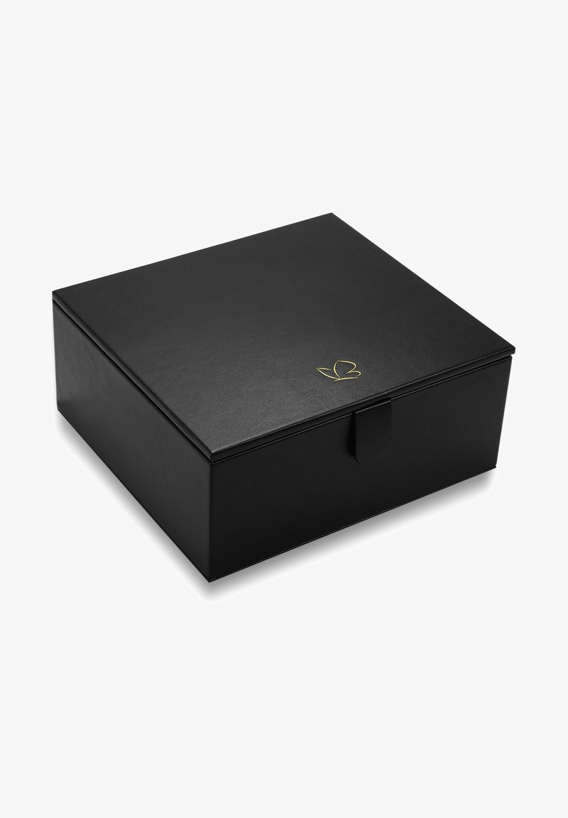 Black rectangular box with a textured surface, featuring a gold leaf logo, a front flap closure, and no visible hardware.