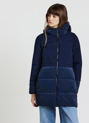 Navy blue puffer coat with a hood, featuring a zip front, smooth upper fabric, and quilted lower section for insulation and comfort.