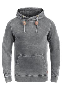 Grijze hoodie met een zachte textuur, kangoeroezak en verstelbare capuchon. Voorzien van contrasterende trekkoorden en geribbelde mouwboorden.