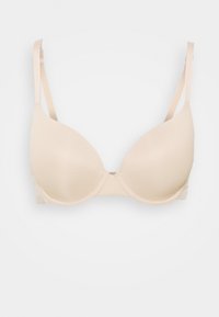 Beige padded bra with adjustable straps, smooth texture, and a classic design featuring a seamless cup and hook-and-eye closure at the back.