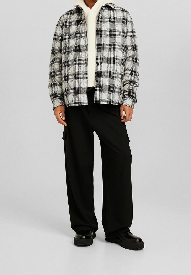 Bershka Giacca da mezza stagione black/nero (Second hand