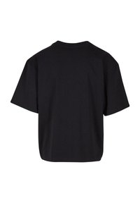 Black, oversized short-sleeve t-shirt with a round neckline, made of smooth cotton fabric. Simple design with no visible logos or patterns.