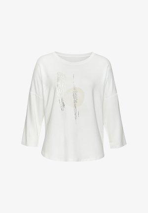 White long-sleeve shirt with a loose fit, featuring a front design of silver sequins and a circular beige accent. Soft fabric texture.