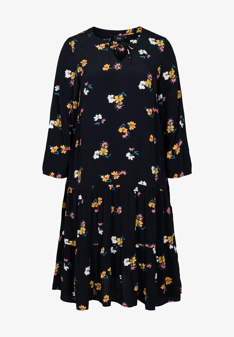 Robe noire à manches longues à volants avec imprimé floral jaune, blanc et rose et décolleté goutte d’eau avec détail noué.