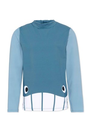 Camiseta da bagno a maniche lunghe per bambini con design del volto di una balena blu, inclusi occhi e denti sulla parte frontale.