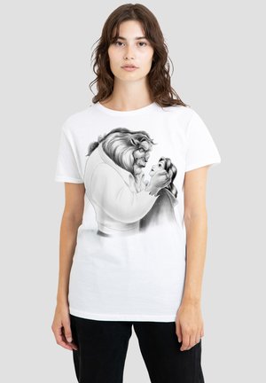 White cotton t-shirt featuring a black and gray graphic illustration of a lion and a woman, detailed with facial expressions and textures.