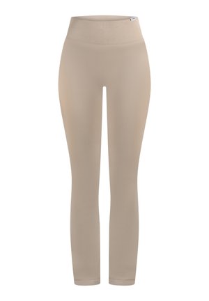 Beżowe legginsy z szerokim prążkowanym paskiem na talii, gładką fakturą i przylegającym krojem, zwężające się przy kostkach dla smukłego wyglądu.