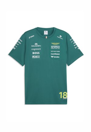 T-shirt vert de l'équipe Aston Martin de Formule 1 avec plusieurs logos de sponsors et le numéro 18 en jaune en bas à droite.