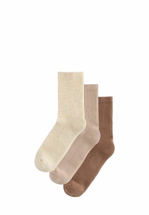 Set van drie sokken in lichtbeige, zachtroze en donkerbruin. Ribbelstructuur, halflange lengte, gladde afwerking.