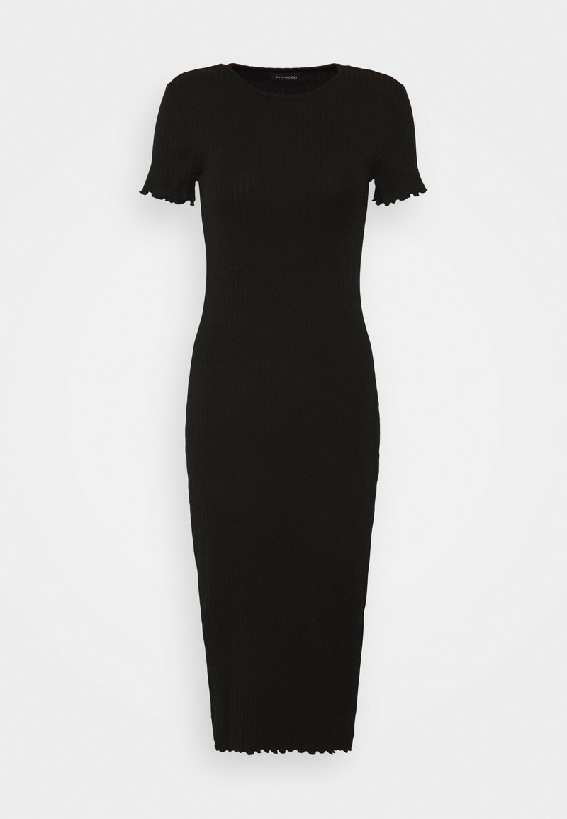 Svart ribbad stickad klänning med korta ärmar, rundad halsringning och vågiga kanter. Snäv passform som sträcker sig till mitt på vadderna.