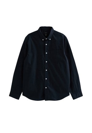 Chemise noire à manches longues avec boutons, col et poche poitrine, posée à plat sur un fond blanc.