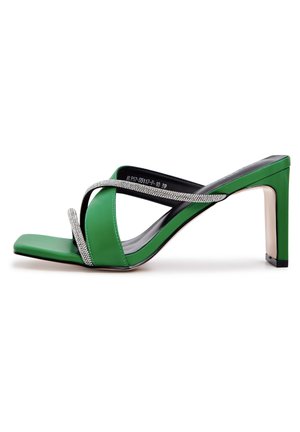 Green leather high-heeled sandal with a square toe, featuring crossed rhinestone-embellished straps and a tapered heel.