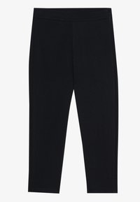 Sorte leggings laget av stretchy stoff, med elastisk midjebånd og en glatt tekstur. Ingen synlige mønstre eller maskinvare detaljer.