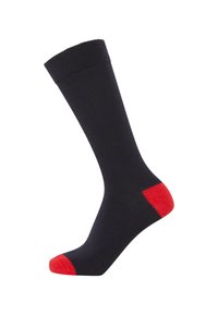 Black cotton sock with a ribbed top, red heel and toe accents, featuring a smooth texture and a standard ankle length design.