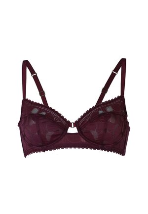 Reggiseno in pizzo bordeaux con coppe semitrasparenti, motivo floreale, spalline regolabili e bordo ondulato lungo i lati. Presenta un accentuato hardware frontale.
