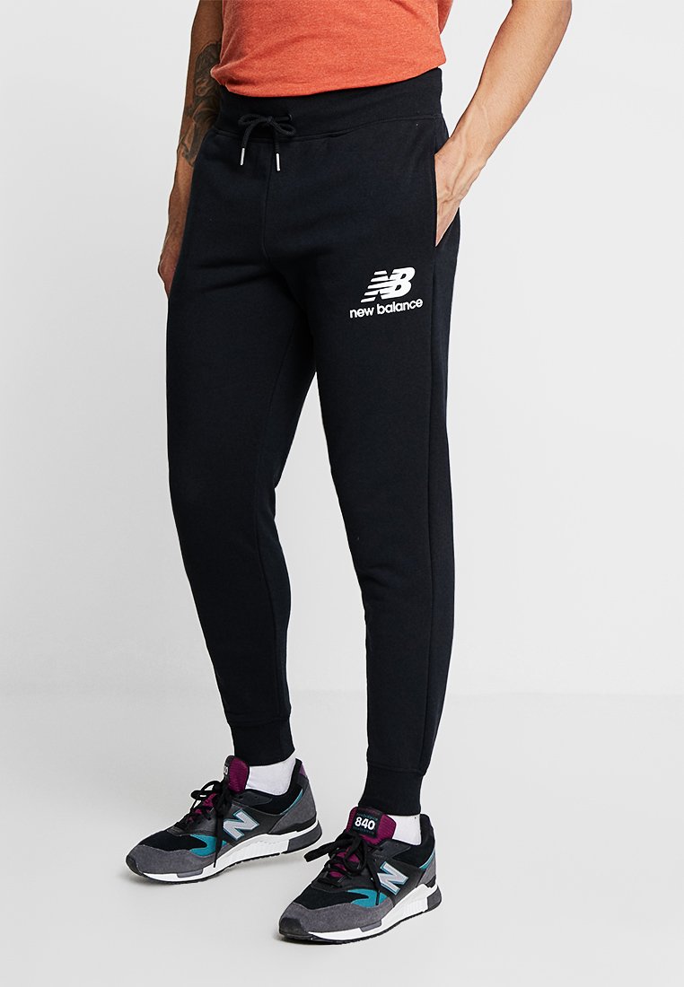 New Balance ESSENTIALS STACKED - Pantalon de survêtement ...